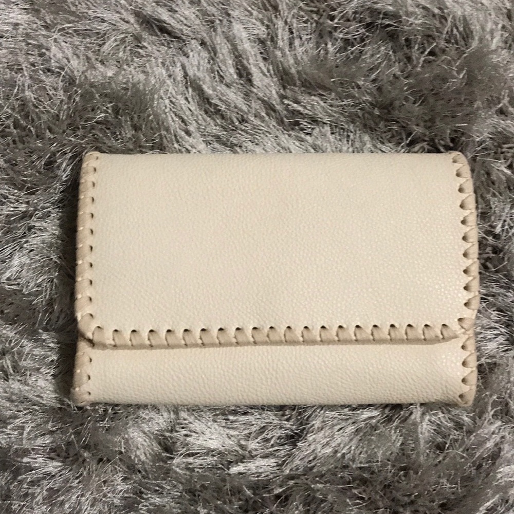 Cream faux leather clutch